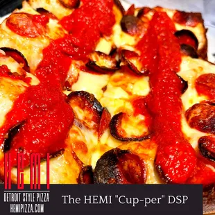 Our "Cupper" pizza with cupping pepperoni, four cheeses and racing stripes of our HEMI sauce