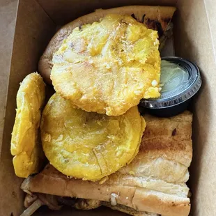 Tostones and pollo sandwich