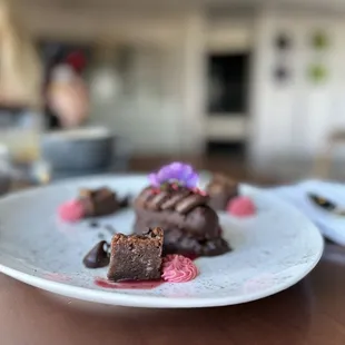 a plate of desserts on a table