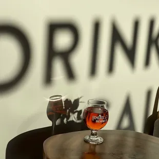 a glass of beer on a table