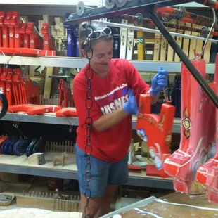 Kim working in the shop.
