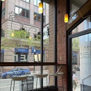 a view of a street through a window