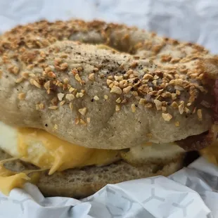 Bacon, egg, and cheese breakfast sandwich on a garlic bagel