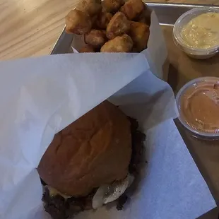 Single burger and crispy sweet potatoes