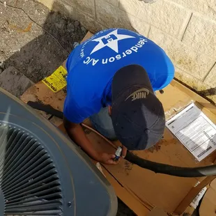Leonard, one of our installers cutting copper.