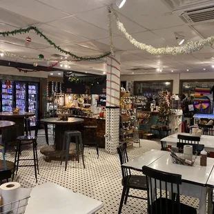 Main dining area and chilled grocery on the far wall. Be sure to get fresh eggs (bottom shelf left, far cooler doors). You&apos;re welcome.