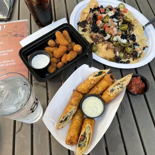 Spicy cheese curds, Nachos with Pulled Pork and Southwest Egg Rolls