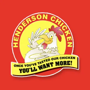 a chicken in a red hat