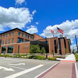 a view of the building from mill street and main facing east