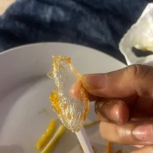 Some type of Plastic wrap was attached to the general chicken