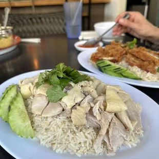 Steamed Dark Meat Chicken and Rice, Crispy Chicken in the back! Solid and yum.