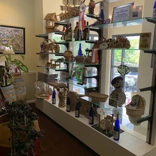a display of bottles and baskets