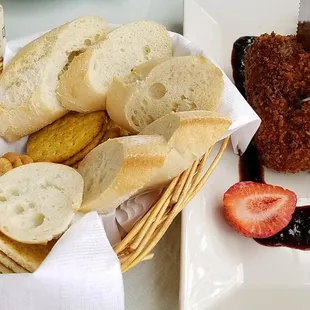 All the bread and crackers that come with the baked cheese appetizer.