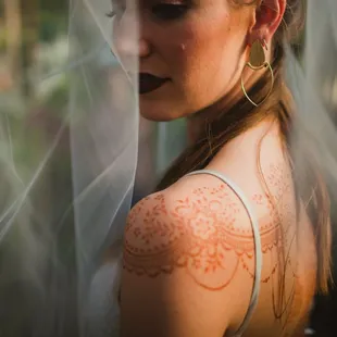Intricate henna designs add a layer of exquisite detail to any special occasion.