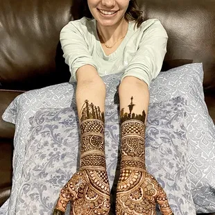 Intricate engagement henna design