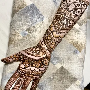 Bridal henna design with the paste still on