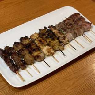 skewers on a white plate