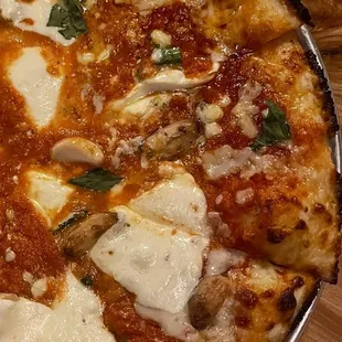 a pizza on a wooden table