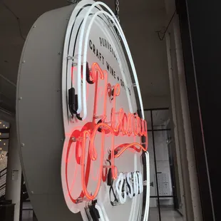 a neon sign for a restaurant