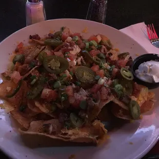 Irish nachos with chicken .