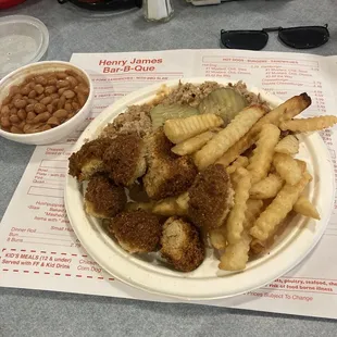 Pulled pork tray with hush puppies,French fries and pinto beens