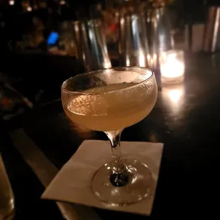 Ether with scotch, French vermouth, yellow chartreuse, and absinthe. Strong bitter tasty cocktail.