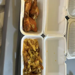 Buffalo wings and chili cheese fries