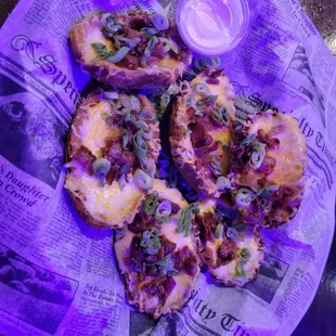 Potato skins with bacon, cheese, and green onion. This was the smaller order.
