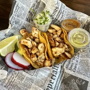 My husband ordered the Chicken Street Tacos which he orders every time we go there, he loves them. He always orders two.