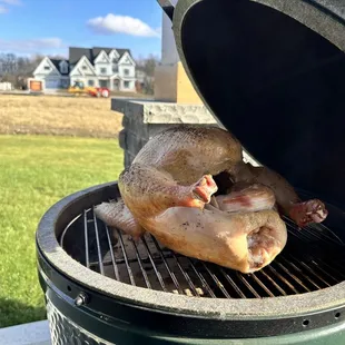 a chicken on the grill