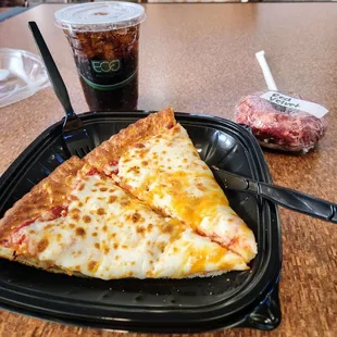 Cheese pizza and red velvet cake donut. Diet Pepsi