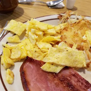 This is what passes for scrambled eggs at Henry&apos;s Diner in Crescent Ia!  Happy mother&apos;s day.  At least the coffee was good.   :-(
