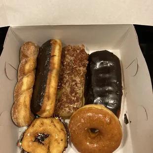 a variety of donuts in a box