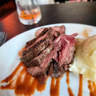 Blackened Lamb Sirloin- Sliced over mashed potatoes, BBQ glaze. ($36) Alright