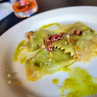 Agnolotti with English pea and Ricotta- Pancetta, Grana Padano, and Mint oil ($18 or $28 for full.) Excellent pasta.