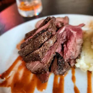 Blackened Lamb Sirloin- Sliced over mashed potatoes, BBQ glaze. ($36) Alright