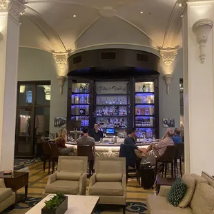 people sitting at the bar