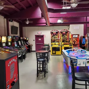 a row of pinball machines