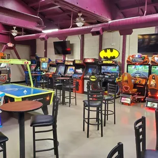 a game room with arcade machines