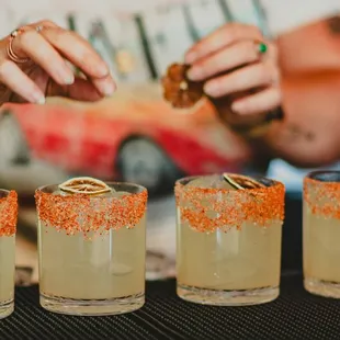a bartender making cocktails