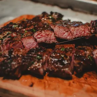 a steak on a cutting board