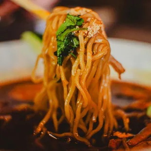 a close up of a bowl of noodles