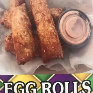 a basket of egg rolls