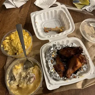 a meal of chicken, macaroni, and cheese