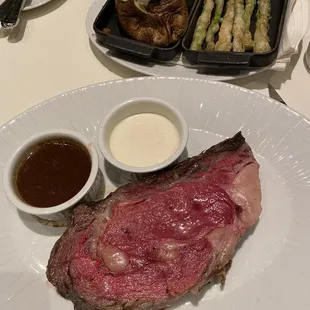Prime rib with choice of two sides - loaded baked potato and tempura asparagus
