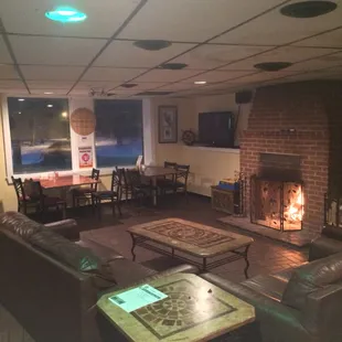 a living room with a fireplace