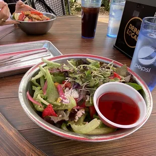Goat salad. Quinoa salad in the background