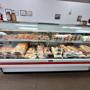 Display case of hotdogs, kielbasa, etc.