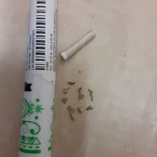 Seeds and stem debris within pre rolled, TOTALLY UNHEALTHY AND TOXIC AND DANGEROUS TO BE INHALING