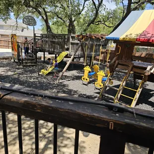 a playground with swings and slides